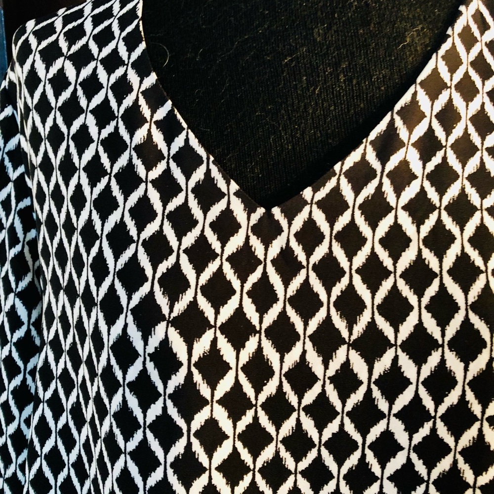 Black and white patterned blouse